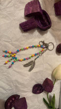 Rainbow feather bag charm